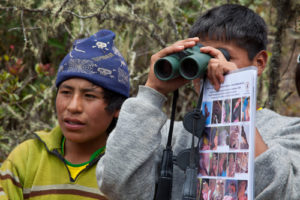 Students holding binoculars newsletter photo