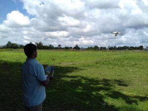 ACOMAT member flying a drone for monitoring their forestry concession. Source: ACCA.